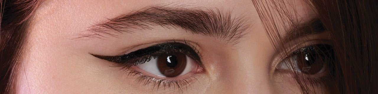 Eyeliner Makeup Tutorials illustrative banner image - close up on woman's Eye with Eyeliner