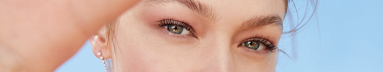 Shop all banner - Close up of Gigi Hadid's Eyes