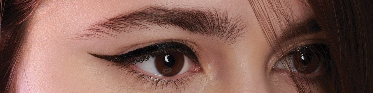 Eyeliner Makeup Tutorials illustrative banner image - close up on woman's Eye with Eyeliner